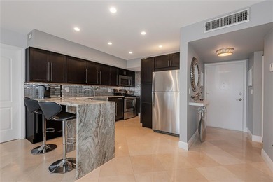 GREAT TURN KEY UNIT WITH GOLF VIEW, ENJOY LOOKING AT TOP GOLFERS on The Diplomat Golf Resort and Spa in Florida - for sale on GolfHomes.com, golf home, golf lot