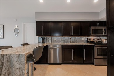 GREAT TURN KEY UNIT WITH GOLF VIEW, ENJOY LOOKING AT TOP GOLFERS on The Diplomat Golf Resort and Spa in Florida - for sale on GolfHomes.com, golf home, golf lot