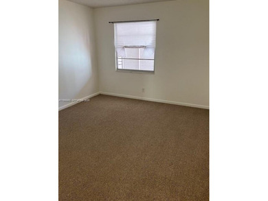 CHARMING 2BR 1.5 BA APARTMENT WITH RELAXING POOL & GARDEN VIEW on Flamingo Lakes Country Club in Florida - for sale on GolfHomes.com, golf home, golf lot