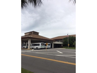 CHARMING 2BR 1.5 BA APARTMENT WITH RELAXING POOL & GARDEN VIEW on Flamingo Lakes Country Club in Florida - for sale on GolfHomes.com, golf home, golf lot