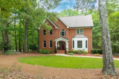 Nestled just off a cul-de-sac on this wooded lot in Reynolds on Reynolds Lake Oconee - The Oconee in Georgia - for sale on GolfHomes.com, golf home, golf lot