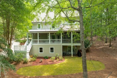 Nestled just off a cul-de-sac on this wooded lot in Reynolds on Reynolds Lake Oconee - The Oconee in Georgia - for sale on GolfHomes.com, golf home, golf lot