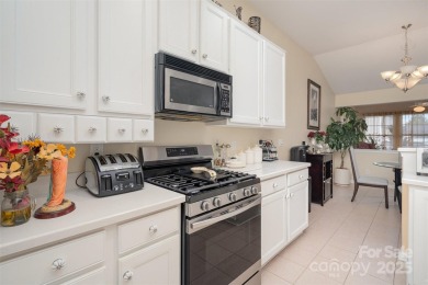 Beautifully maintained 1.5-story home in the sought-after on Highland Creek Golf Club in North Carolina - for sale on GolfHomes.com, golf home, golf lot