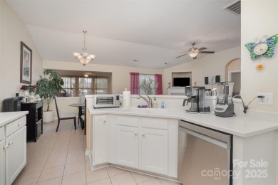 Beautifully maintained 1.5-story home in the sought-after on Highland Creek Golf Club in North Carolina - for sale on GolfHomes.com, golf home, golf lot