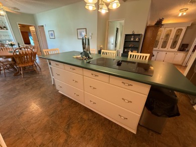 This well-cared for home is being sold furnished.  It is located on Del Tura Golf and Country Club in Florida - for sale on GolfHomes.com, golf home, golf lot