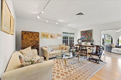 WATERFRONT GEM! Discover one of the largest villas in the highly on Atlantis Golf Club in Florida - for sale on GolfHomes.com, golf home, golf lot