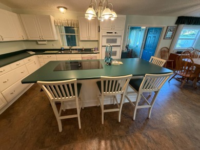 This well-cared for home is being sold furnished.  It is located on Del Tura Golf and Country Club in Florida - for sale on GolfHomes.com, golf home, golf lot