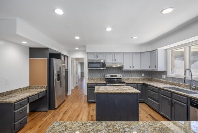 Stunning 4-bedroom, 3-bathroom brick residence situated on a on Woodside Plantation Country Club in South Carolina - for sale on GolfHomes.com, golf home, golf lot
