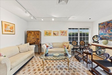 WATERFRONT GEM! Discover one of the largest villas in the highly on Atlantis Golf Club in Florida - for sale on GolfHomes.com, golf home, golf lot