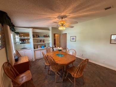 This well-cared for home is being sold furnished.  It is located on Del Tura Golf and Country Club in Florida - for sale on GolfHomes.com, golf home, golf lot