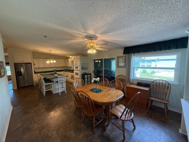 This well-cared for home is being sold furnished.  It is located on Del Tura Golf and Country Club in Florida - for sale on GolfHomes.com, golf home, golf lot