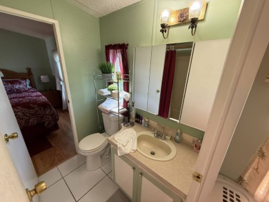 This well-cared for home is being sold furnished.  It is located on Del Tura Golf and Country Club in Florida - for sale on GolfHomes.com, golf home, golf lot