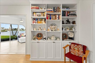 WATERFRONT GEM! Discover one of the largest villas in the highly on Atlantis Golf Club in Florida - for sale on GolfHomes.com, golf home, golf lot