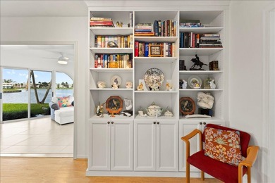 WATERFRONT GEM! Discover one of the largest villas in the highly on Atlantis Golf Club in Florida - for sale on GolfHomes.com, golf home, golf lot