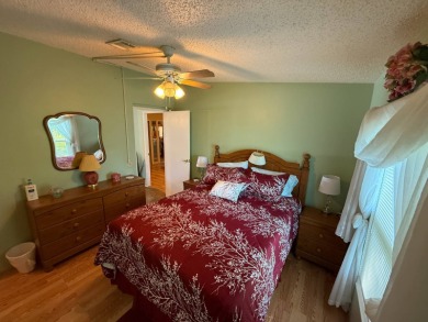 This well-cared for home is being sold furnished.  It is located on Del Tura Golf and Country Club in Florida - for sale on GolfHomes.com, golf home, golf lot