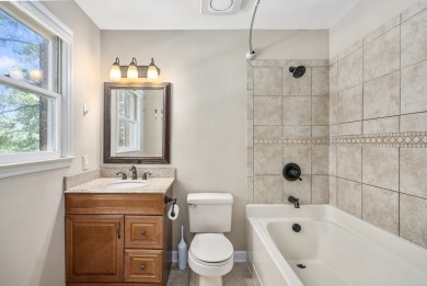 Stunning 4-bedroom, 3-bathroom brick residence situated on a on Woodside Plantation Country Club in South Carolina - for sale on GolfHomes.com, golf home, golf lot