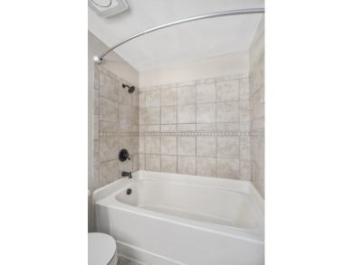Stunning 4-bedroom, 3-bathroom brick residence situated on a on Woodside Plantation Country Club in South Carolina - for sale on GolfHomes.com, golf home, golf lot
