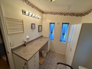 This well-cared for home is being sold furnished.  It is located on Del Tura Golf and Country Club in Florida - for sale on GolfHomes.com, golf home, golf lot