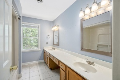 Stunning 4-bedroom, 3-bathroom brick residence situated on a on Woodside Plantation Country Club in South Carolina - for sale on GolfHomes.com, golf home, golf lot
