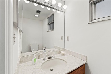 WATERFRONT GEM! Discover one of the largest villas in the highly on Atlantis Golf Club in Florida - for sale on GolfHomes.com, golf home, golf lot