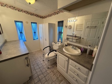 This well-cared for home is being sold furnished.  It is located on Del Tura Golf and Country Club in Florida - for sale on GolfHomes.com, golf home, golf lot