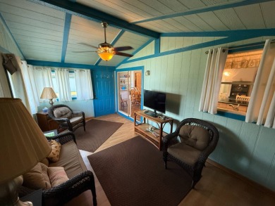 This well-cared for home is being sold furnished.  It is located on Del Tura Golf and Country Club in Florida - for sale on GolfHomes.com, golf home, golf lot