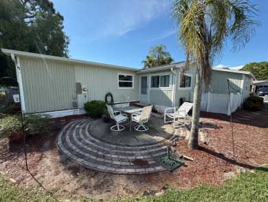 This well-cared for home is being sold furnished.  It is located on Del Tura Golf and Country Club in Florida - for sale on GolfHomes.com, golf home, golf lot