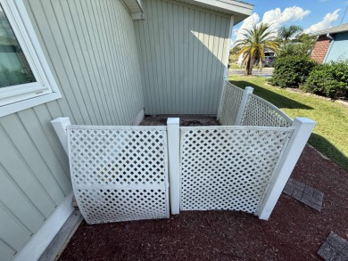 This well-cared for home is being sold furnished.  It is located on Del Tura Golf and Country Club in Florida - for sale on GolfHomes.com, golf home, golf lot