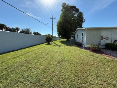 This well-cared for home is being sold furnished.  It is located on Del Tura Golf and Country Club in Florida - for sale on GolfHomes.com, golf home, golf lot