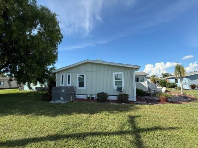 This well-cared for home is being sold furnished.  It is located on Del Tura Golf and Country Club in Florida - for sale on GolfHomes.com, golf home, golf lot