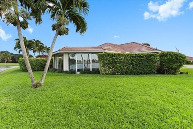 WATERFRONT GEM! Discover one of the largest villas in the highly on Atlantis Golf Club in Florida - for sale on GolfHomes.com, golf home, golf lot