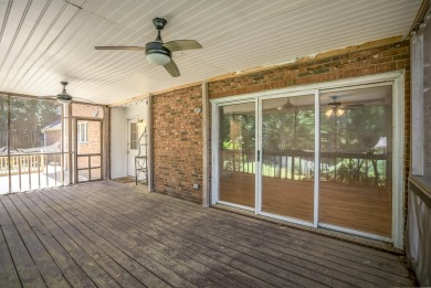 Stunning 4-bedroom, 3-bathroom brick residence situated on a on Woodside Plantation Country Club in South Carolina - for sale on GolfHomes.com, golf home, golf lot