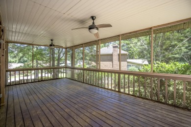 Stunning 4-bedroom, 3-bathroom brick residence situated on a on Woodside Plantation Country Club in South Carolina - for sale on GolfHomes.com, golf home, golf lot