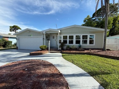 This well-cared for home is being sold furnished.  It is located on Del Tura Golf and Country Club in Florida - for sale on GolfHomes.com, golf home, golf lot