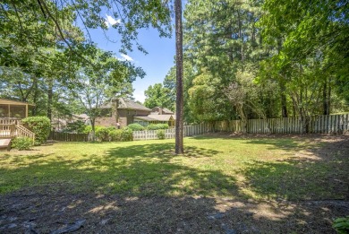 Stunning 4-bedroom, 3-bathroom brick residence situated on a on Woodside Plantation Country Club in South Carolina - for sale on GolfHomes.com, golf home, golf lot