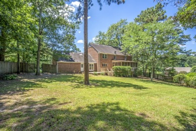 Stunning 4-bedroom, 3-bathroom brick residence situated on a on Woodside Plantation Country Club in South Carolina - for sale on GolfHomes.com, golf home, golf lot