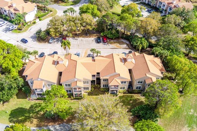 First-floor golf villa located in the heart of PGA Village on PGA Golf Club in PGA Village in Florida - for sale on GolfHomes.com, golf home, golf lot