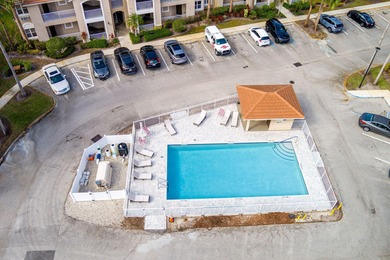 First-floor golf villa located in the heart of PGA Village on PGA Golf Club in PGA Village in Florida - for sale on GolfHomes.com, golf home, golf lot