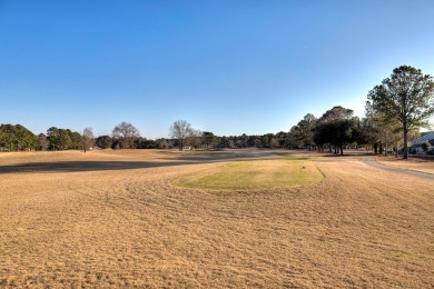 Beautiful 3BR, 2BA home overlooking the 18th tee box of the on Players Course At Wyboo Plantation in South Carolina - for sale on GolfHomes.com, golf home, golf lot