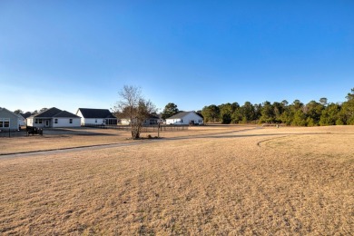 Beautiful 3BR, 2BA home overlooking the 18th tee box of the on Players Course At Wyboo Plantation in South Carolina - for sale on GolfHomes.com, golf home, golf lot