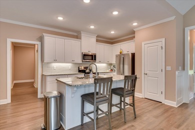 Newer lake home with large Finished Room Over Garage (FROG) An on Monticello Golf Club At Savannah Lakes in South Carolina - for sale on GolfHomes.com, golf home, golf lot