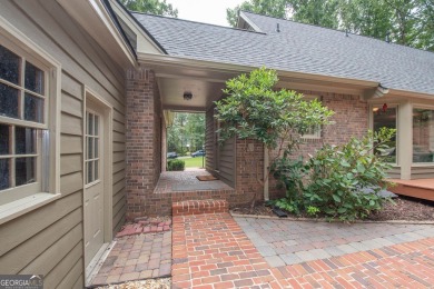 PERFECT LOCATION and MOVE-IN READY with wonderful curb appeal on on Canongate At Flat Creek Club in Georgia - for sale on GolfHomes.com, golf home, golf lot