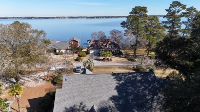 Absolutely gorgeous home, with in ground pool, views of Lake on Santee-Cooper Country Club in South Carolina - for sale on GolfHomes.com, golf home, golf lot