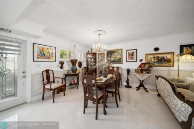 This elegant and tasteful unit features two bedrooms and two on Hollybrook Golf and Tennis Club  in Florida - for sale on GolfHomes.com, golf home, golf lot