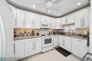 This elegant and tasteful unit features two bedrooms and two on Hollybrook Golf and Tennis Club  in Florida - for sale on GolfHomes.com, golf home, golf lot