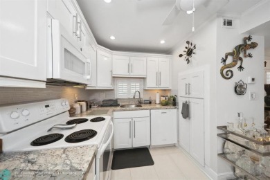 This elegant and tasteful unit features two bedrooms and two on Hollybrook Golf and Tennis Club  in Florida - for sale on GolfHomes.com, golf home, golf lot