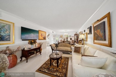 This elegant and tasteful unit features two bedrooms and two on Hollybrook Golf and Tennis Club  in Florida - for sale on GolfHomes.com, golf home, golf lot