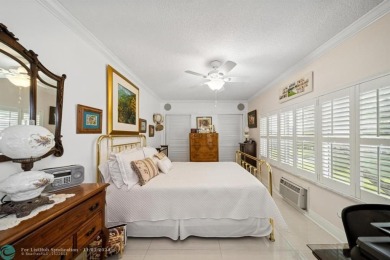 This elegant and tasteful unit features two bedrooms and two on Hollybrook Golf and Tennis Club  in Florida - for sale on GolfHomes.com, golf home, golf lot