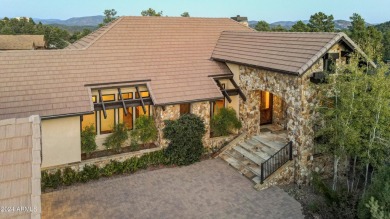 Nestled in the prestigious Rim Golf Club, this stunning custom on The Rim Golf Club in Arizona - for sale on GolfHomes.com, golf home, golf lot