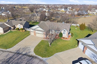 This beautifully designed 5-bedroom, 3-bath ranch with a 4-car on Auburn Hills Golf Course in Kansas - for sale on GolfHomes.com, golf home, golf lot